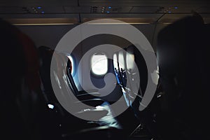 Airplane interior, empty seats and windows