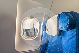 Airplane interior with view on New York City. Tourism and travel