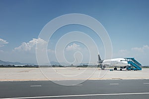 Airplane landed on airfield photo