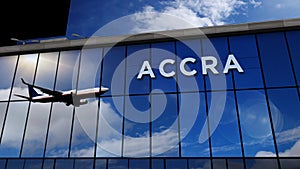 Airplane landing at Accra Ghana airport mirrored in terminal