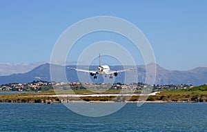 Airplane landing on airport Corfu town