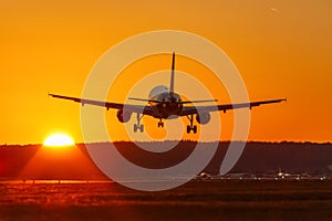 Airplane landing flying airport sun sunset vacation holidays travel traveling plane