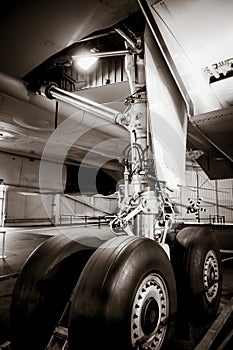 Airplane landing gear detail. Black and white photo