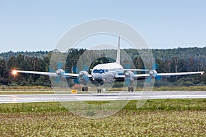 Airplane landing on runway