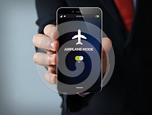 airplane mode businessman smartphone photo