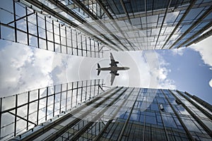 Airplane and modern buildings