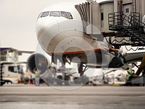 Airplane near the terminal in an airport