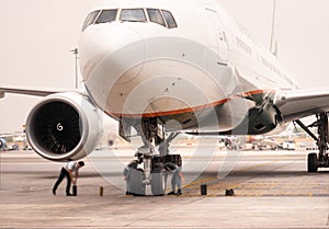 Airplane near the terminal in an airport