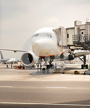 Airplane near the terminal in an airport