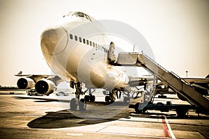 Airplane near the terminal in an airport