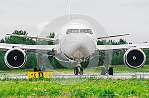 Airplane nose cockpit view airplane taxiing at the airport.