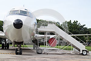 Airplane nose with passenger stairs