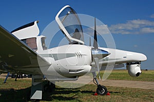 Airplane with open cockpit