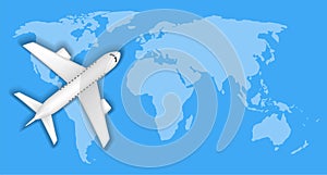Airplane over blue world map travel concept
