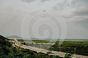 Airplane over highway to Brazzaville in Congo