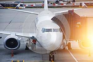 Airplane passenger gangway of the terminal building at the airport, aircraft flight maintenance