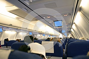 Airplane with passengers interior view