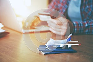 Airplane with passports near paying with credit card