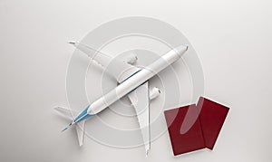 Airplane and passports. travel concept. white background