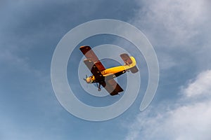 airplane plane with propellers spraying crops with pesticides and herbicides against insects and plant diseases