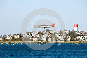 Airplane preparing for landing at Logan airport. photo