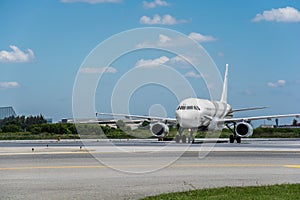 Airplane ready to take off from runway