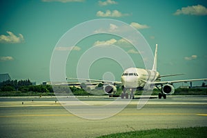 Airplane ready to take off from runway