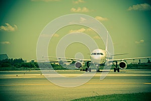 Airplane ready to take off from runway