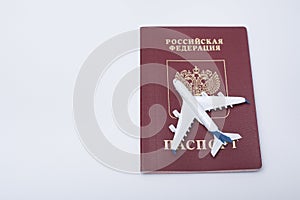 Airplane on the russian passport. Travel concept. White background
