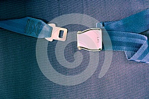 Airplane safety seatbelt closeup.