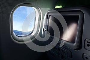 Airplane seat with tv screen photo