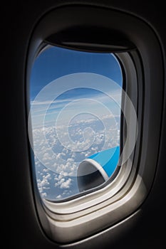 Airplane seat and window inside an aircraft