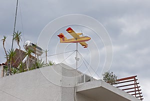 The airplane-shaped weather vane