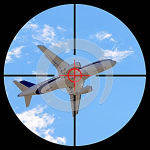Airplane in the sight of anti-aircraft weapons. Missile defense system aimed at passenger plane in the sky. The unidentified plane
