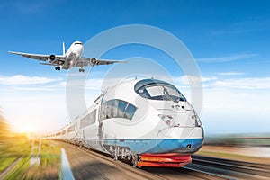 Airplane in the sky and high-speed train, the concept of passenger transport.