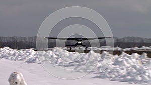 Airplane standing on a runway ready to take off .