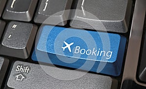 Airplane symbol button on computer keyboard, Online booking or purchase of plane ticket, Business travel concept.