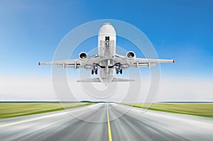 Airplane taking off from the runway airport sky blue.