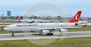 Airplane taxiing on runway of the airport