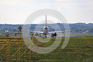 Airplane taxiing to the runway.