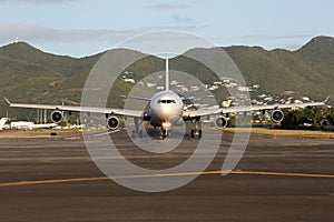 Airplane taxis to takeoff position at airport