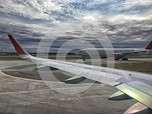 Airplane at the terminal gate ready for takeoff