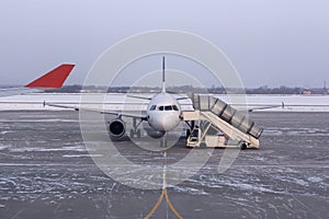 Airplane at the terminal gate ready for takeoff