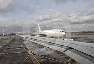 Airplane at the terminal gate ready for takeoff