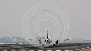 Airplane touchdown on runway