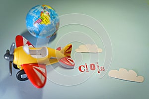 Airplane toy with CO2 word, global warming concept.