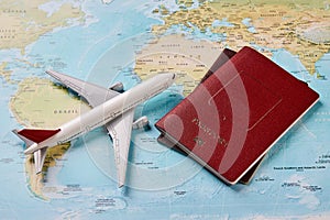 Airplane and two passports travel documents