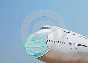 Airplane wear hygienic face surgical mask for protection outbreak spreading coronavirus Covid- 19