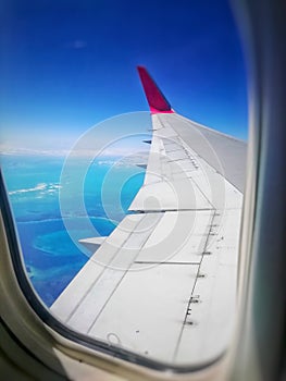 Airplane window at hight altitud AmÃÂ©rica photo