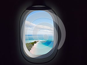 Airplane window paradisiac beach sea View